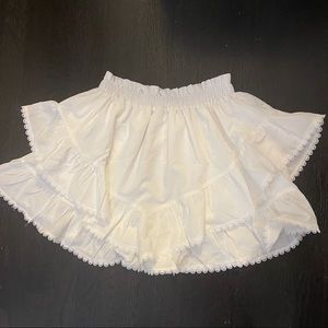 White ruffle skirt.